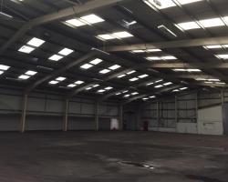 131 ft x 100 ft x 23 ft - (40m x 30.5m x 7m) Used Steel Building