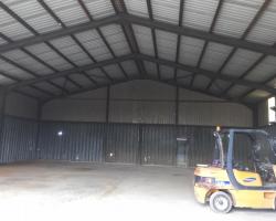 60 ft x 54 ft x 18 ft - (18.3m x 16.5m x 5.5m) Used Steel Building